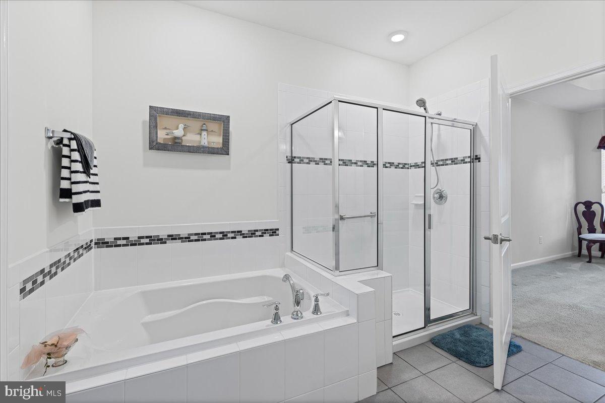 54 Heals Farm Road Burlington, NJ 08016 - Photo 17 of 26 a bathroom with a bathtub a toilet and a shower