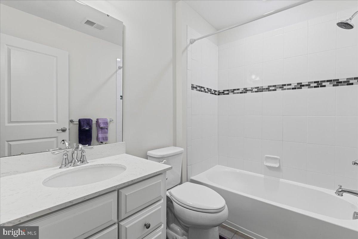 54 Heals Farm Road Burlington, NJ 08016 - Photo 21 of 26 a bathroom with a sink toilet and shower