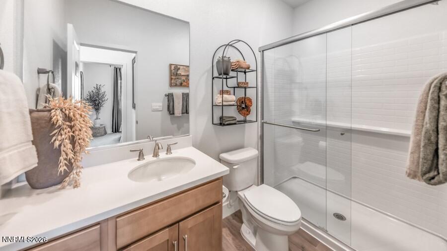 494 Daisy Fay Way Carson City, NV 89705 - Photo 24 of 28 a bathroom with a sink toilet and shower
