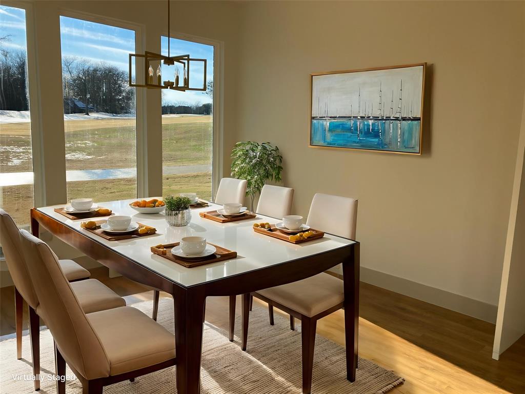 39290 Cedar Trail Whitney, TX 76692 - Photo 2 of 10 a view of a dining room with furniture window and outside view