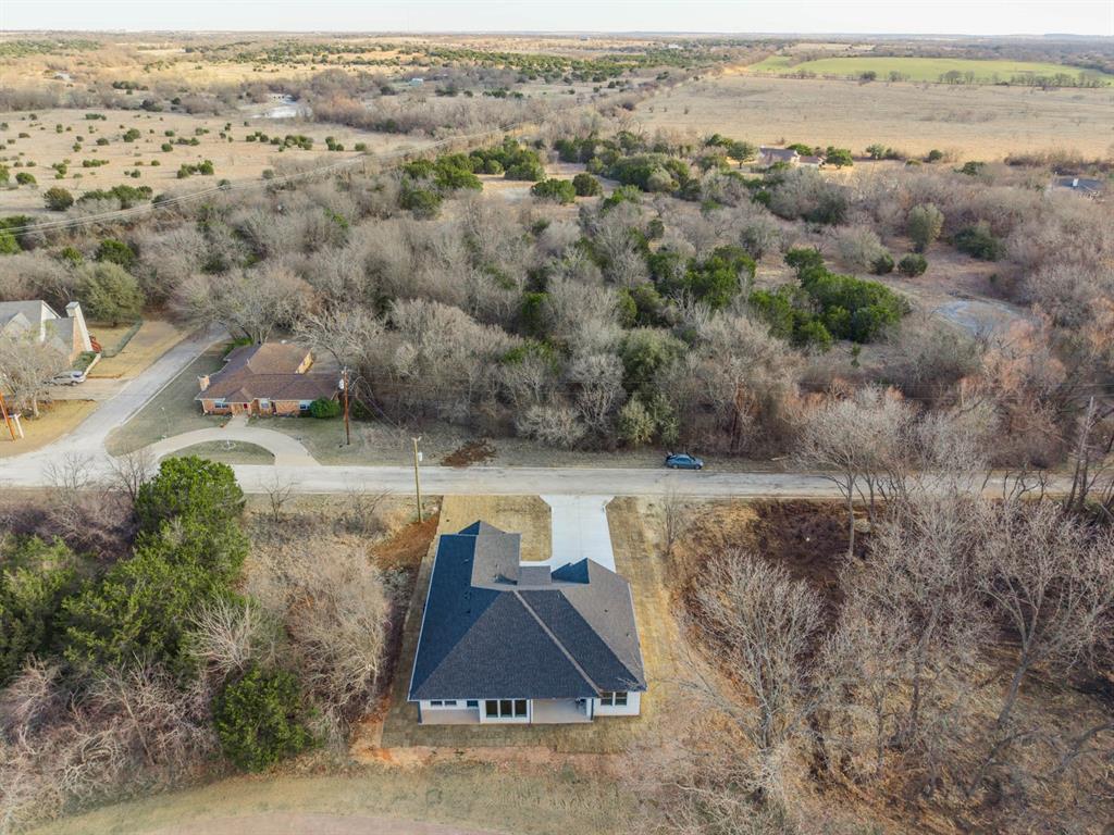 39290 Cedar Trail Whitney, TX 76692 - Photo 37 of 40 an aerial view of house with yard and lake view