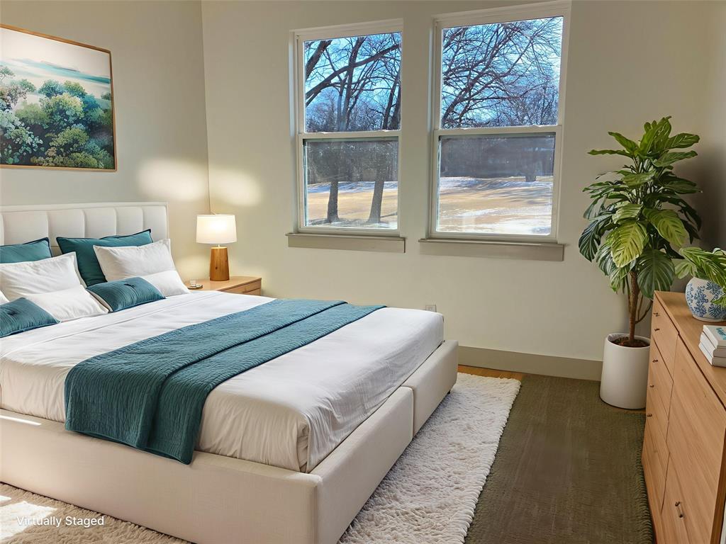 39290 Cedar Trail Whitney, TX 76692 - Photo 7 of 10 a bedroom with bed and a potted plant