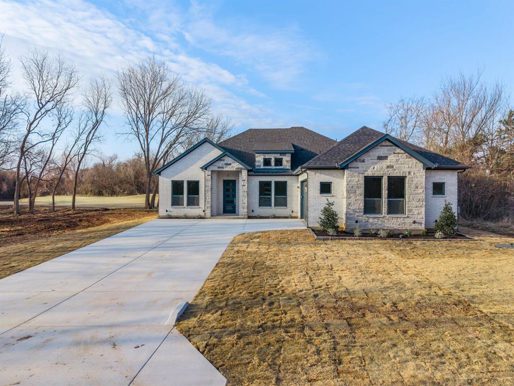 39290 Cedar Trail Whitney, TX 76692 - Photo 9 of 40 a front view of a house with a yard