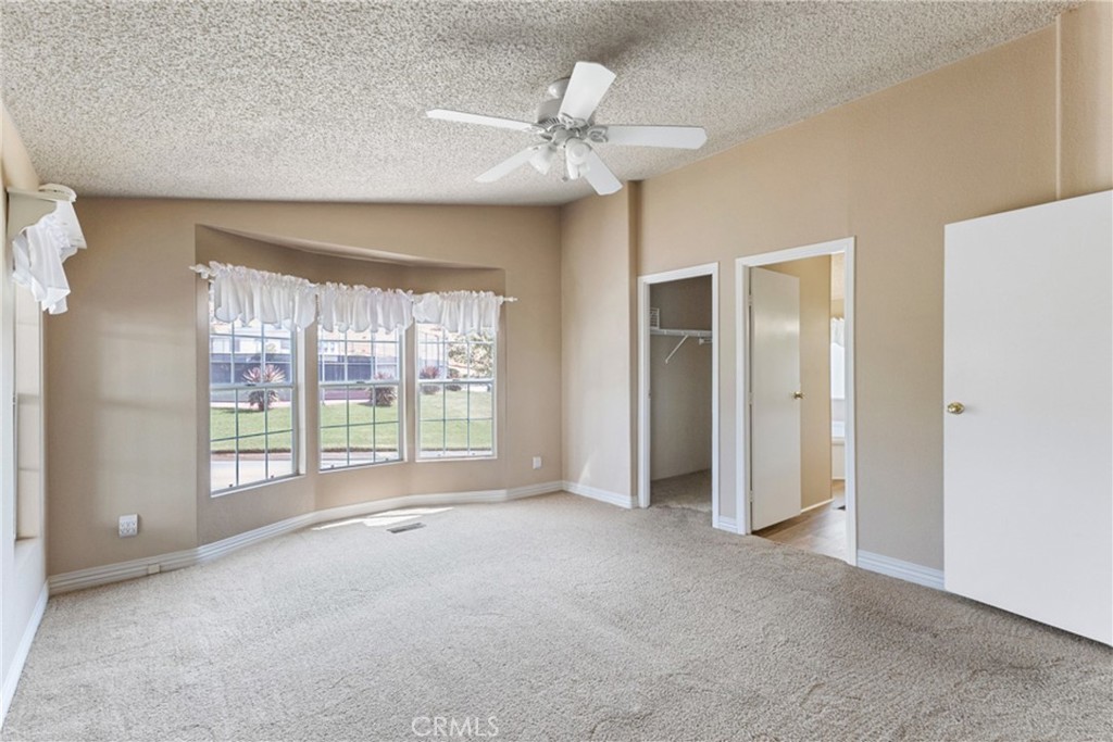33105 Santiago Road, Unit 149 Acton, CA 93510 - Photo 21 of 28 a view of an empty room with a window