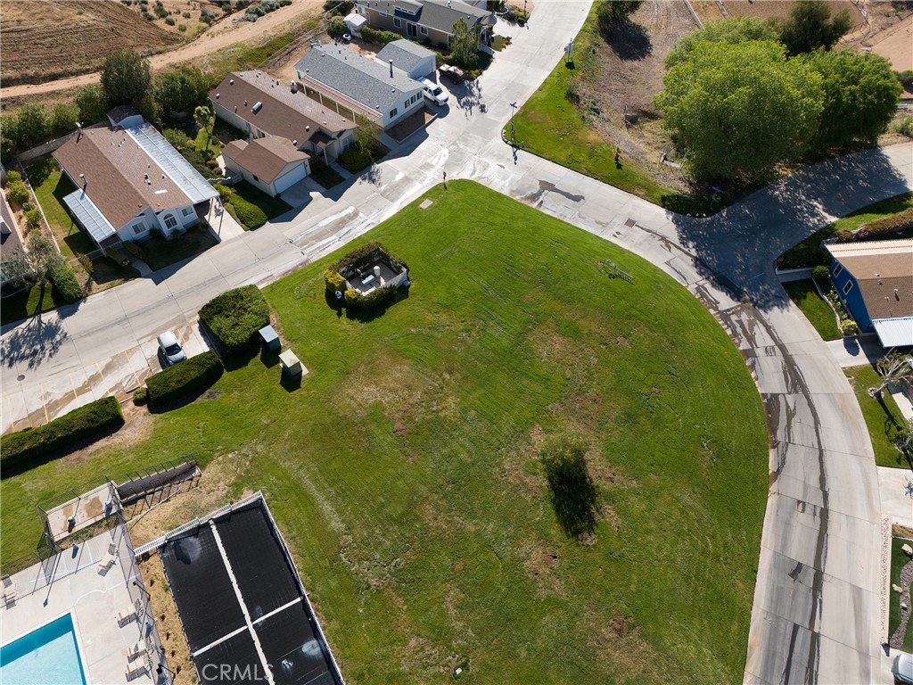 33105 Santiago Road, Unit 149 Acton, CA 93510 - Photo 28 of 28 an aerial view of residential houses with outdoor space