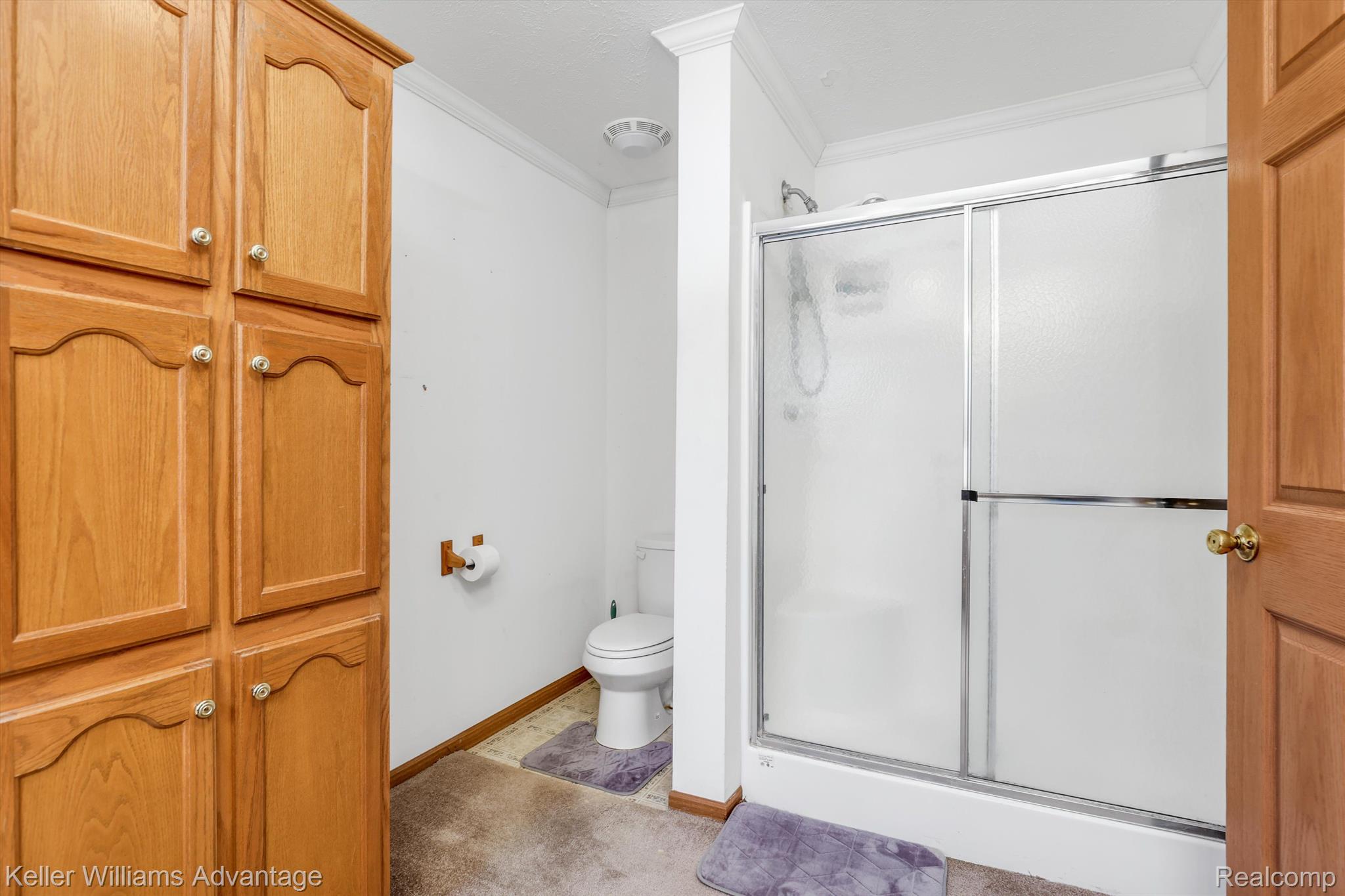 12242 Bunton Road Willis, MI 48191 - Photo 8 of 27 Primary Bath also boasts a full size shower!