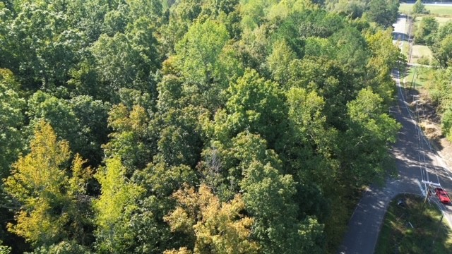 0 Chalk Hill Church Road Camden, TN 38320 - Photo 5 of 57 an aerial view of residential house with outdoor space and trees all around