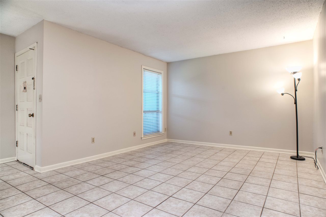 983 June Road, Unit 1 Memphis, TN 38119 - Photo 2 of 14 16x12 Living Room with FRESH Paint and Tile Floor