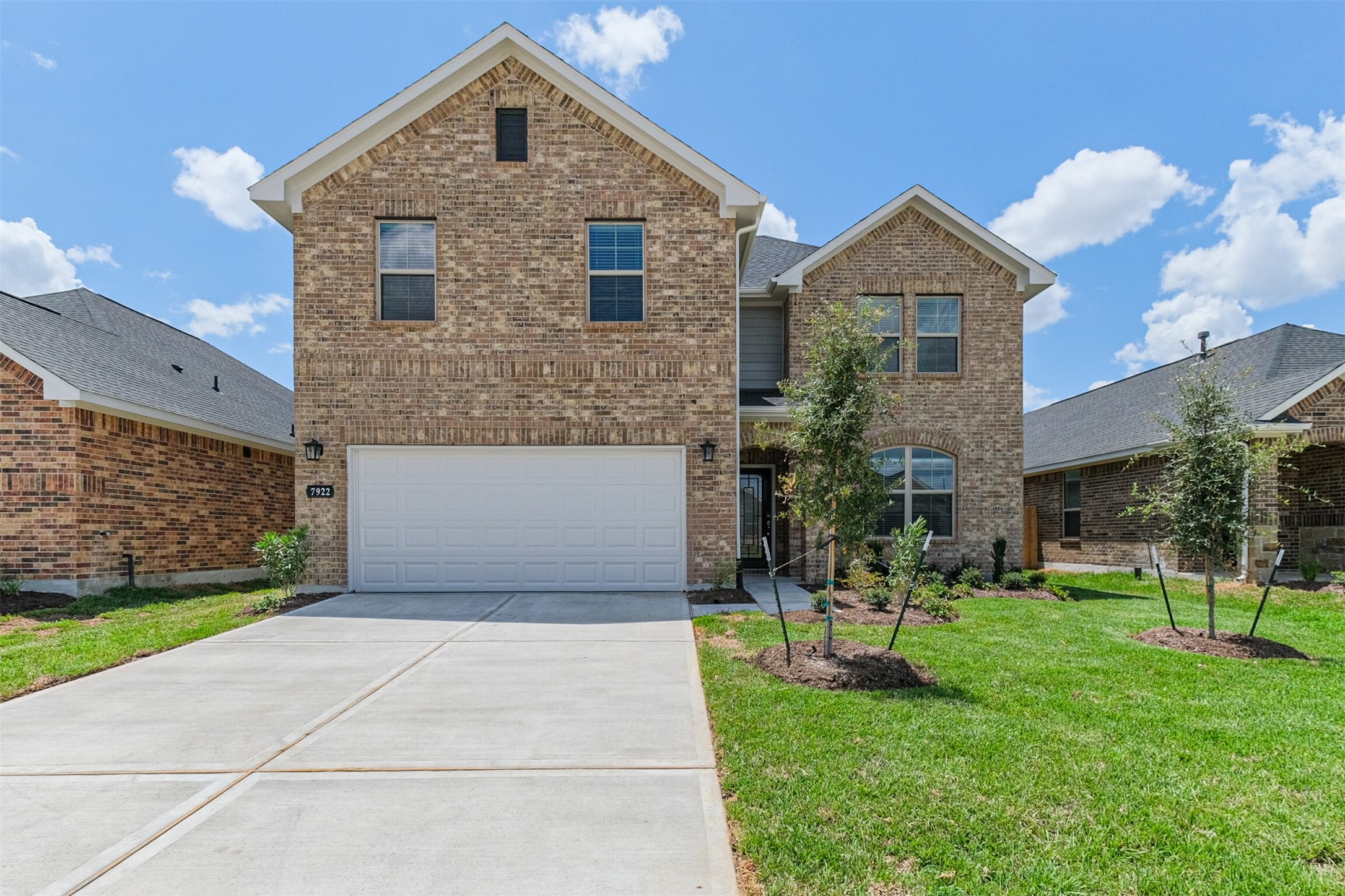 7922 Chukka Drive Fulshear, TX 77441 - Photo 14 of 39 a front view of a house with a yard and garage