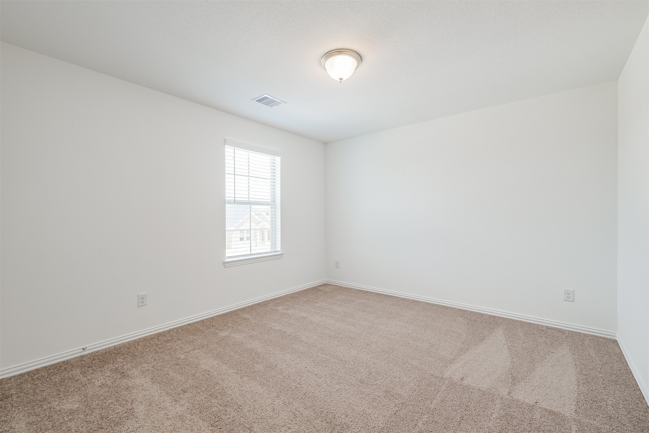 7922 Chukka Drive Fulshear, TX 77441 - Photo 18 of 39 an empty room with windows
