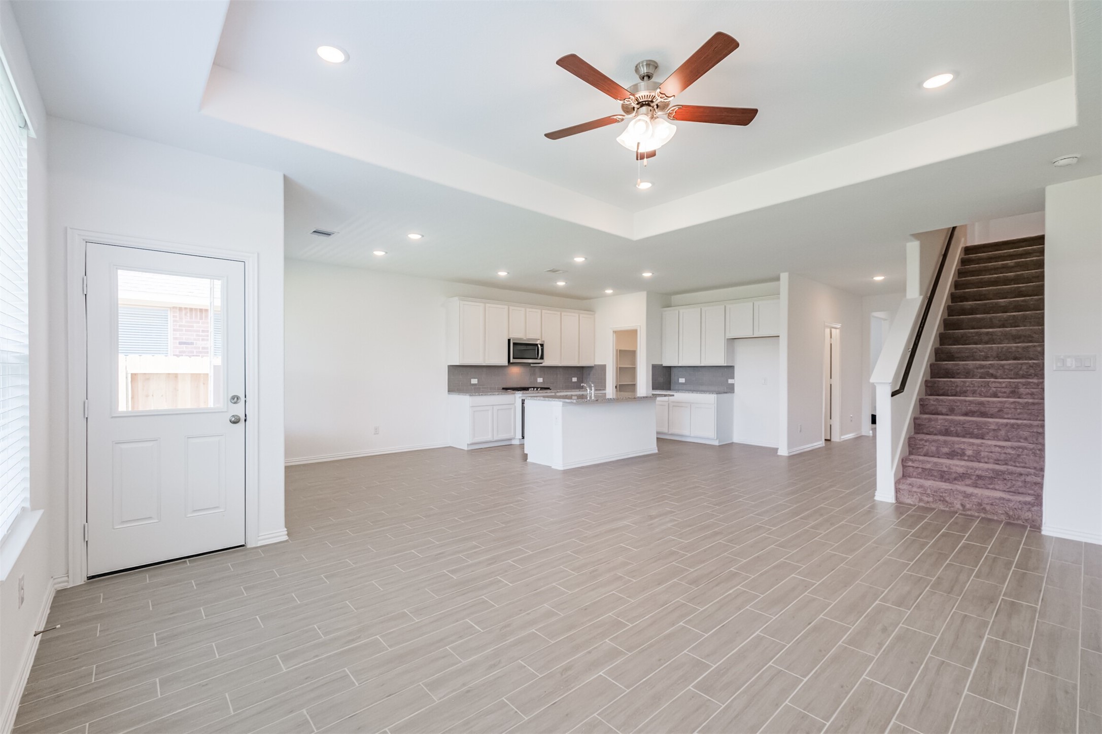 7922 Chukka Drive Fulshear, TX 77441 - Photo 27 of 39 a view of kitchen with cabinets and wooden floor