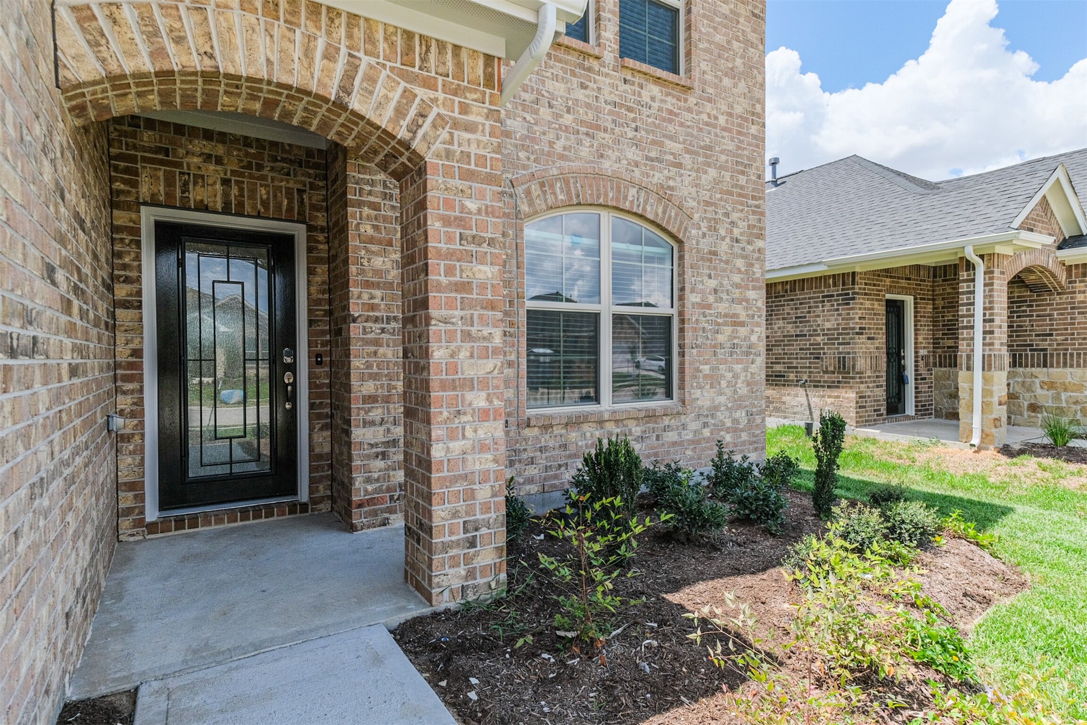 7922 Chukka Drive Fulshear, TX 77441 - Photo 3 of 39 a front view of a house with garden