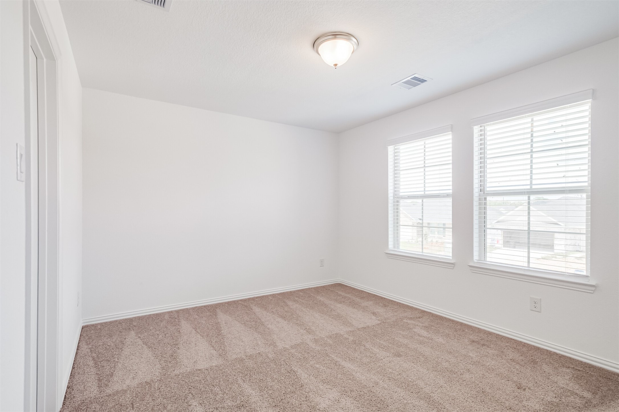 7922 Chukka Drive Fulshear, TX 77441 - Photo 31 of 39 an empty room with a window