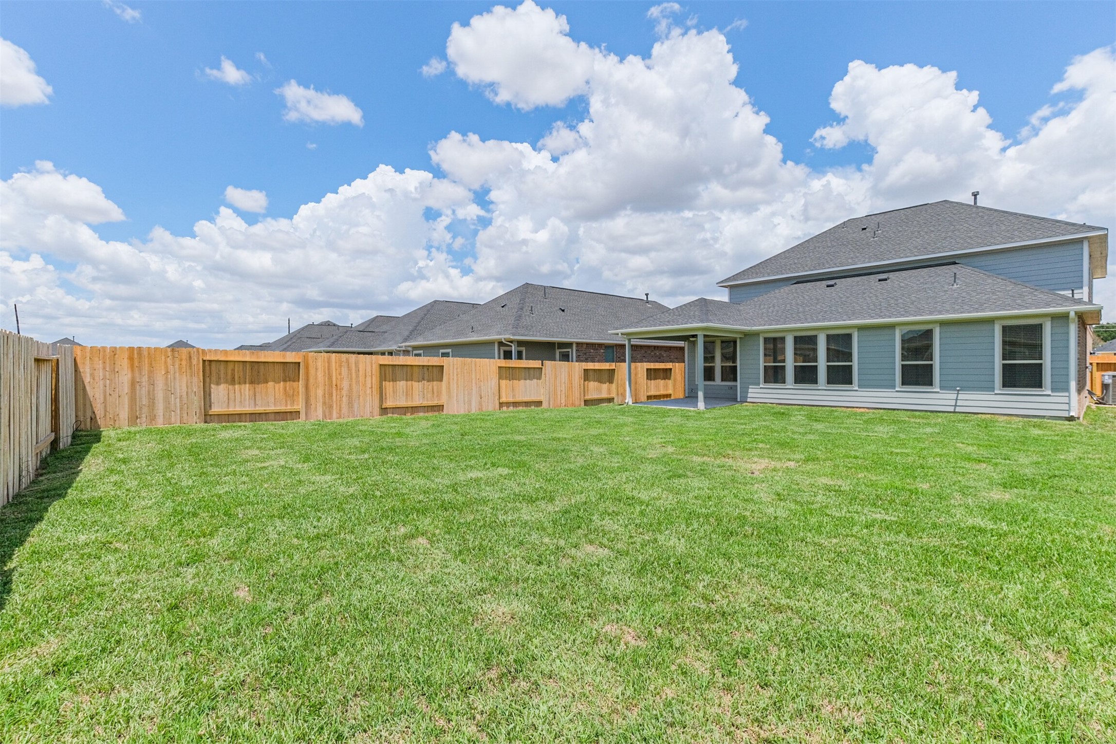 7922 Chukka Drive Fulshear, TX 77441 - Photo 35 of 39 a front view of a house with garden