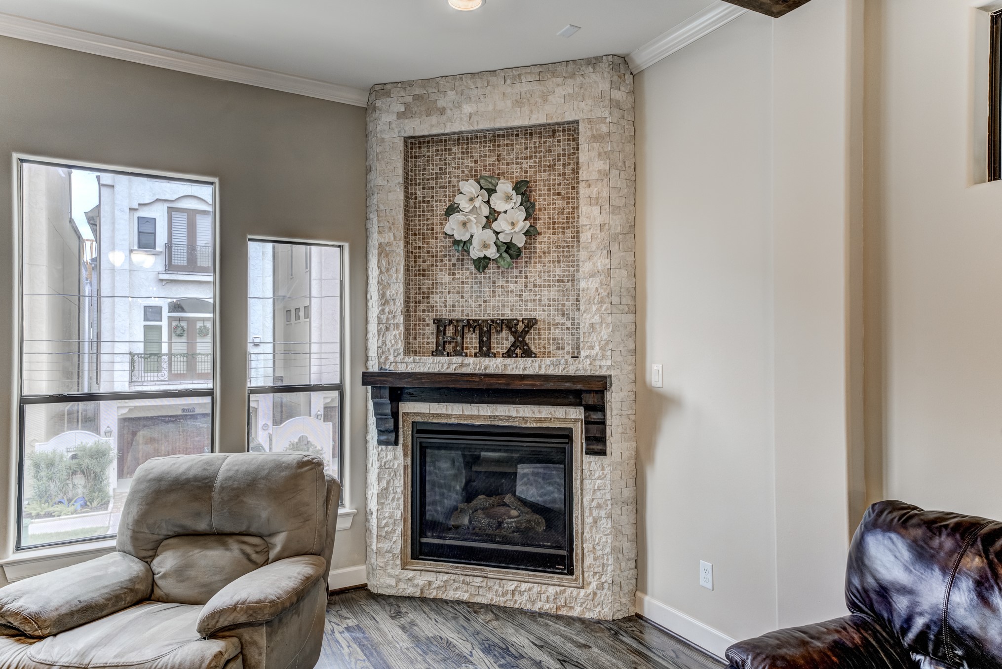 2308 Couch Street Houston, TX 77008 - Photo 14 of 50 a living room with furniture and a fireplace