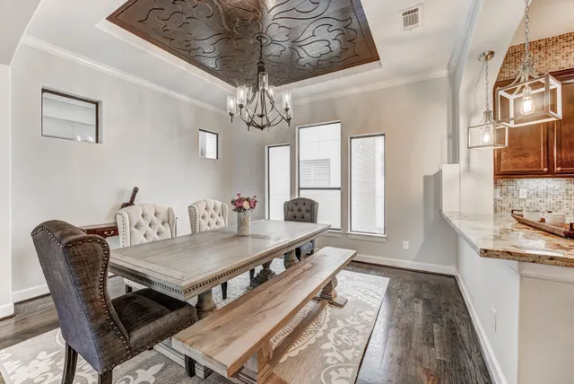 a kitchen with a stove and cabinets