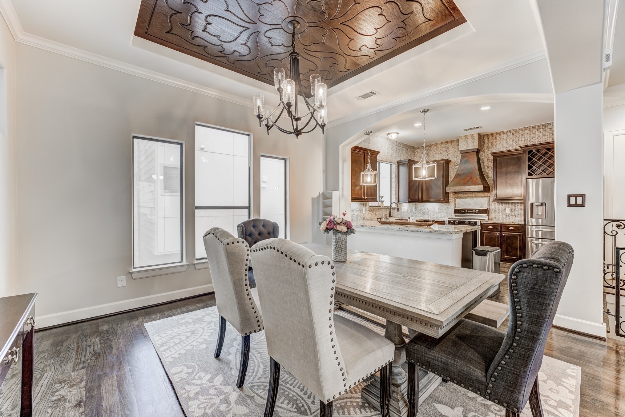 2308 Couch Street Houston, TX 77008 - Photo 16 of 50 a view of a dining room with furniture window and wooden floor