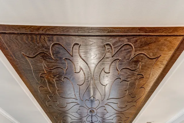 a bed room with a bed and a chair