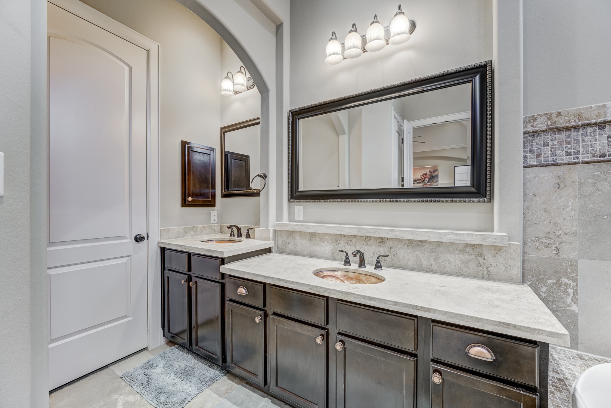2308 Couch Street Houston, TX 77008 - Photo 30 of 50 a bathroom with a sink vanity and mirror
