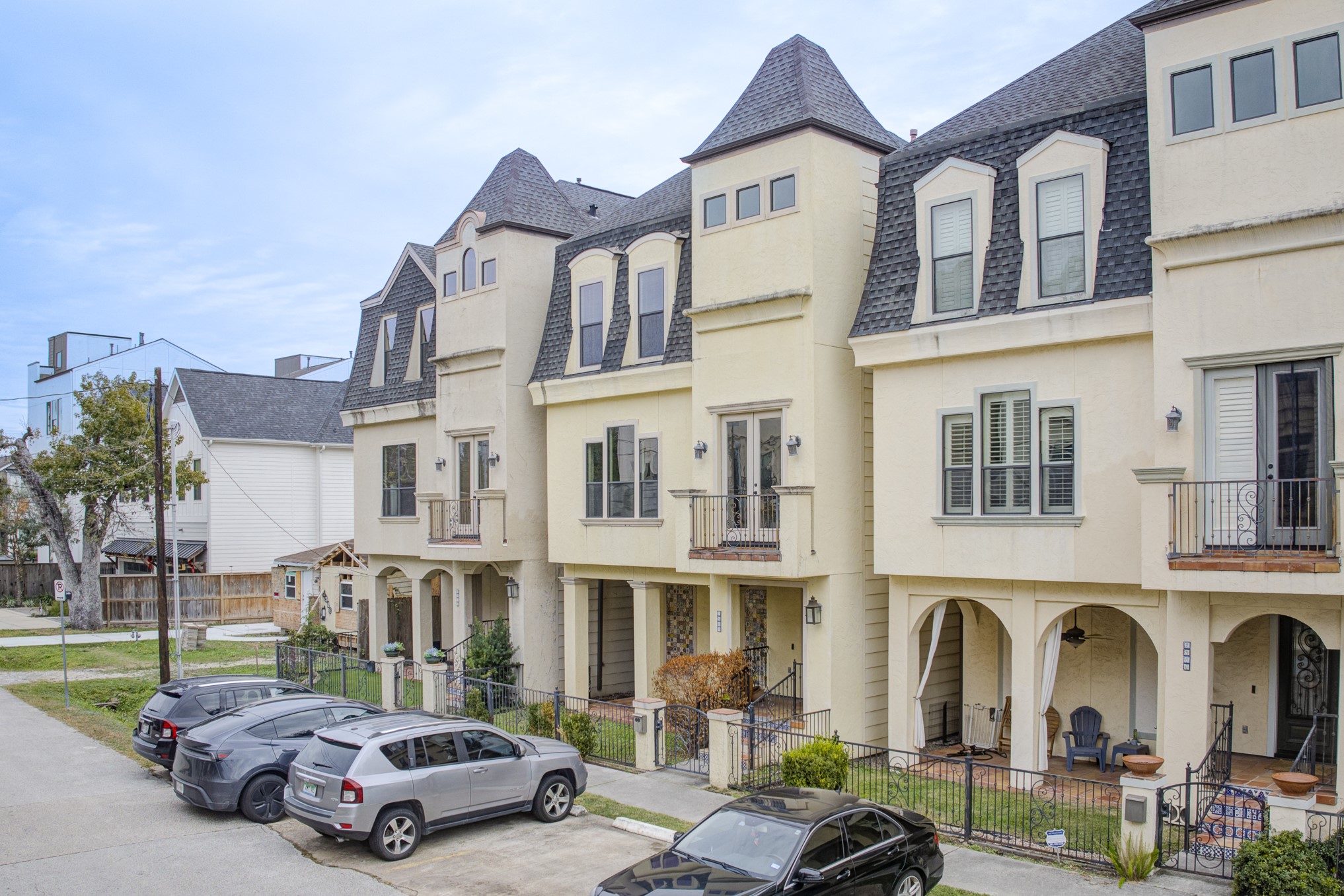 2308 Couch Street Houston, TX 77008 - Photo 3 of 50 a car parked in front of a brick building