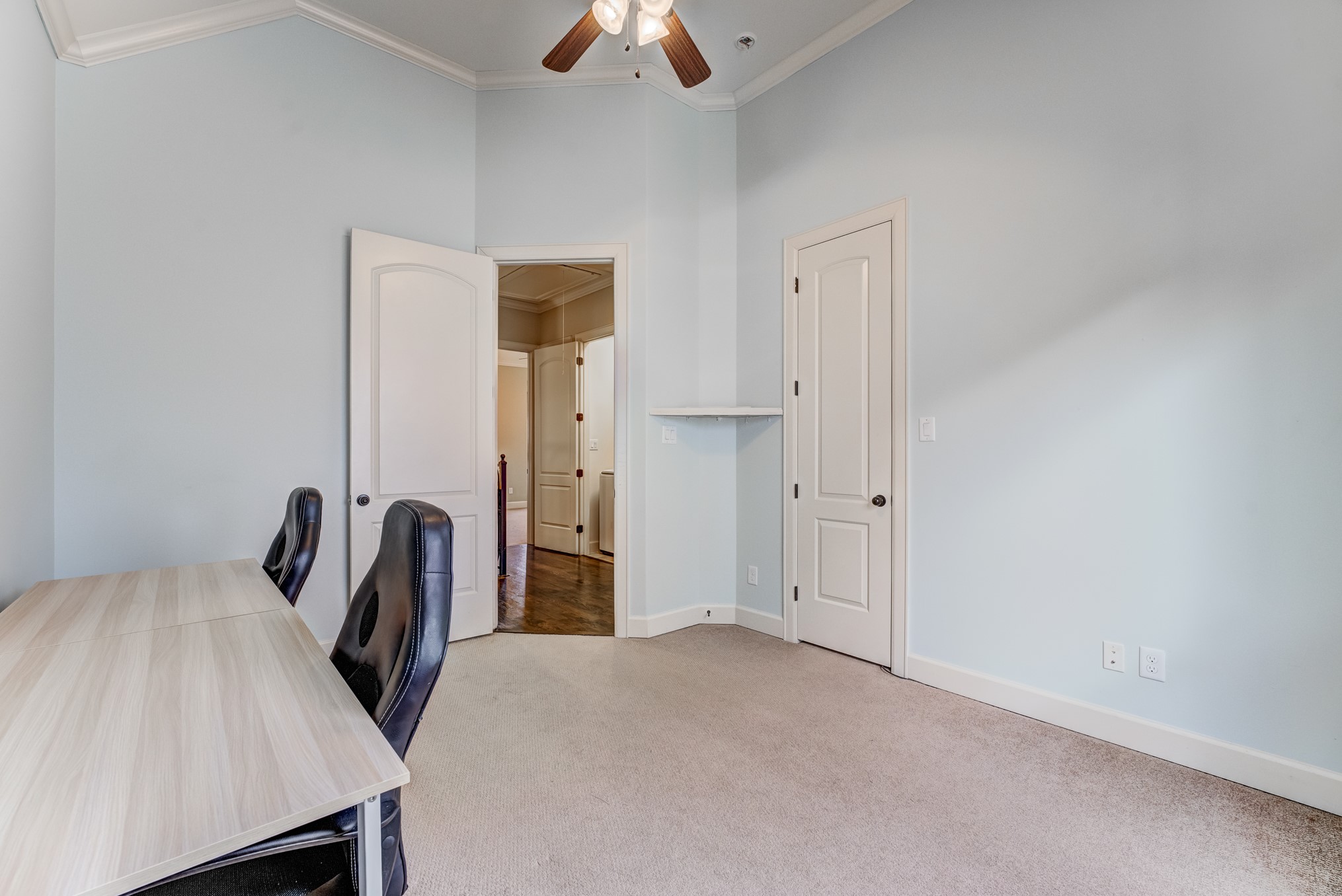 2308 Couch Street Houston, TX 77008 - Photo 40 of 50 a bedroom with a bed and a chandelier