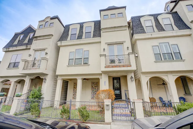 a view of an entryway with wooden floor and door