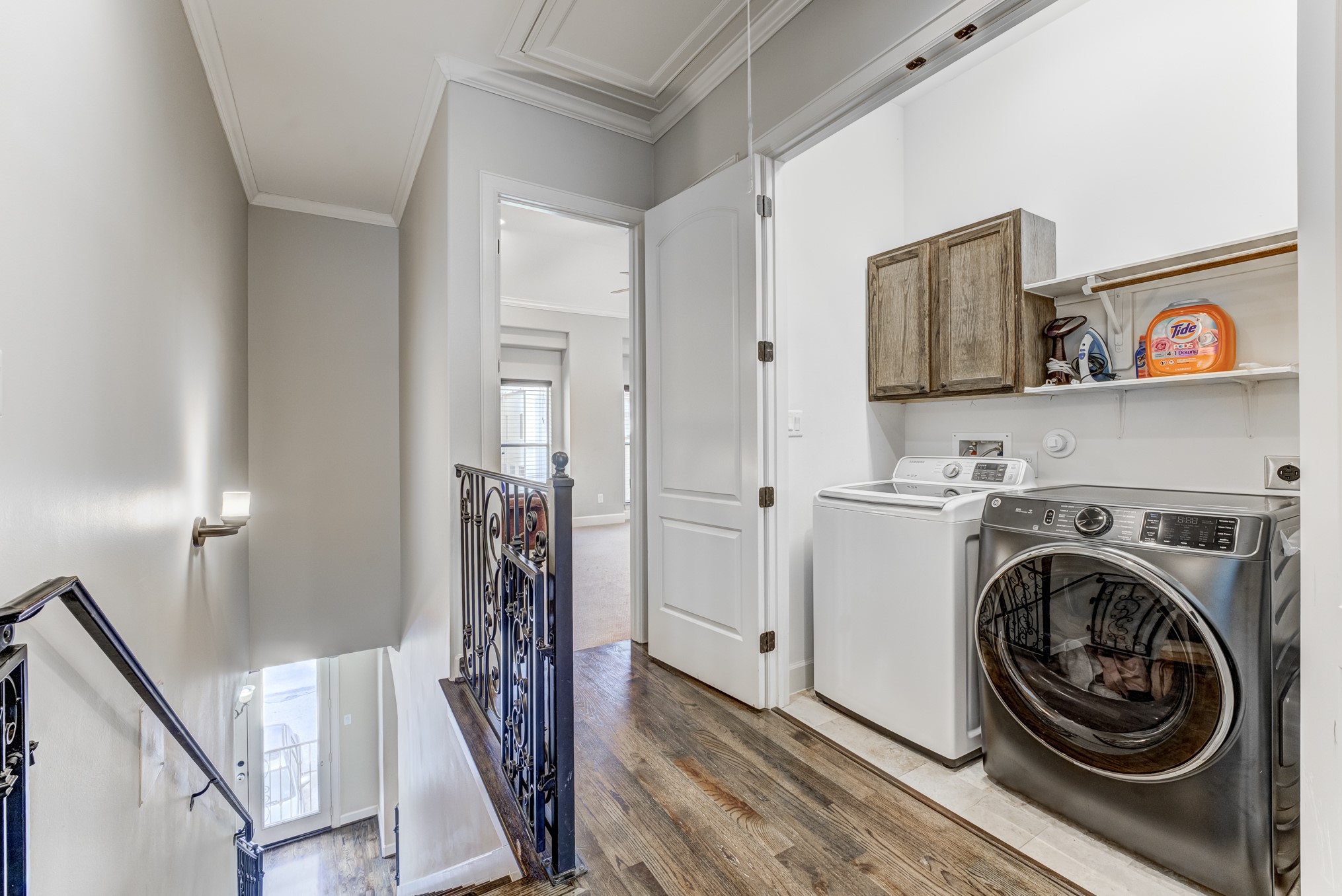 2308 Couch Street Houston, TX 77008 - Photo 42 of 50 a view of a hallway with washer and dryer