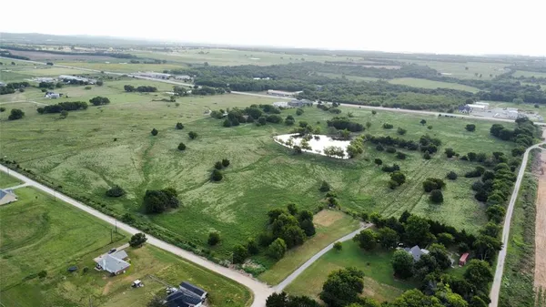 an aerial view of mountain with trees