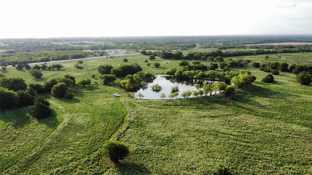 a view of a green field with lots of green space