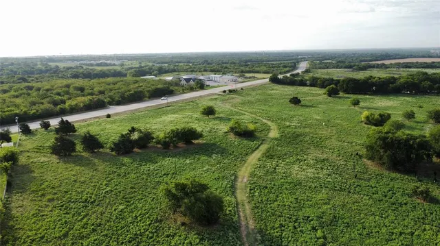 a view of a green field with lots of green space
