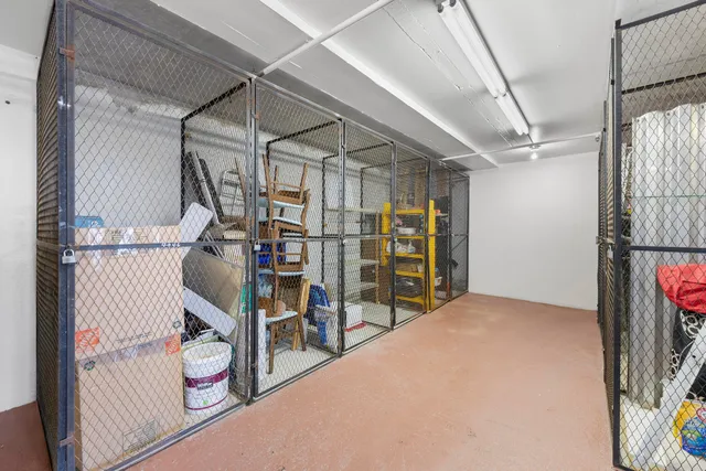 a view of a swimming pool in front of the house