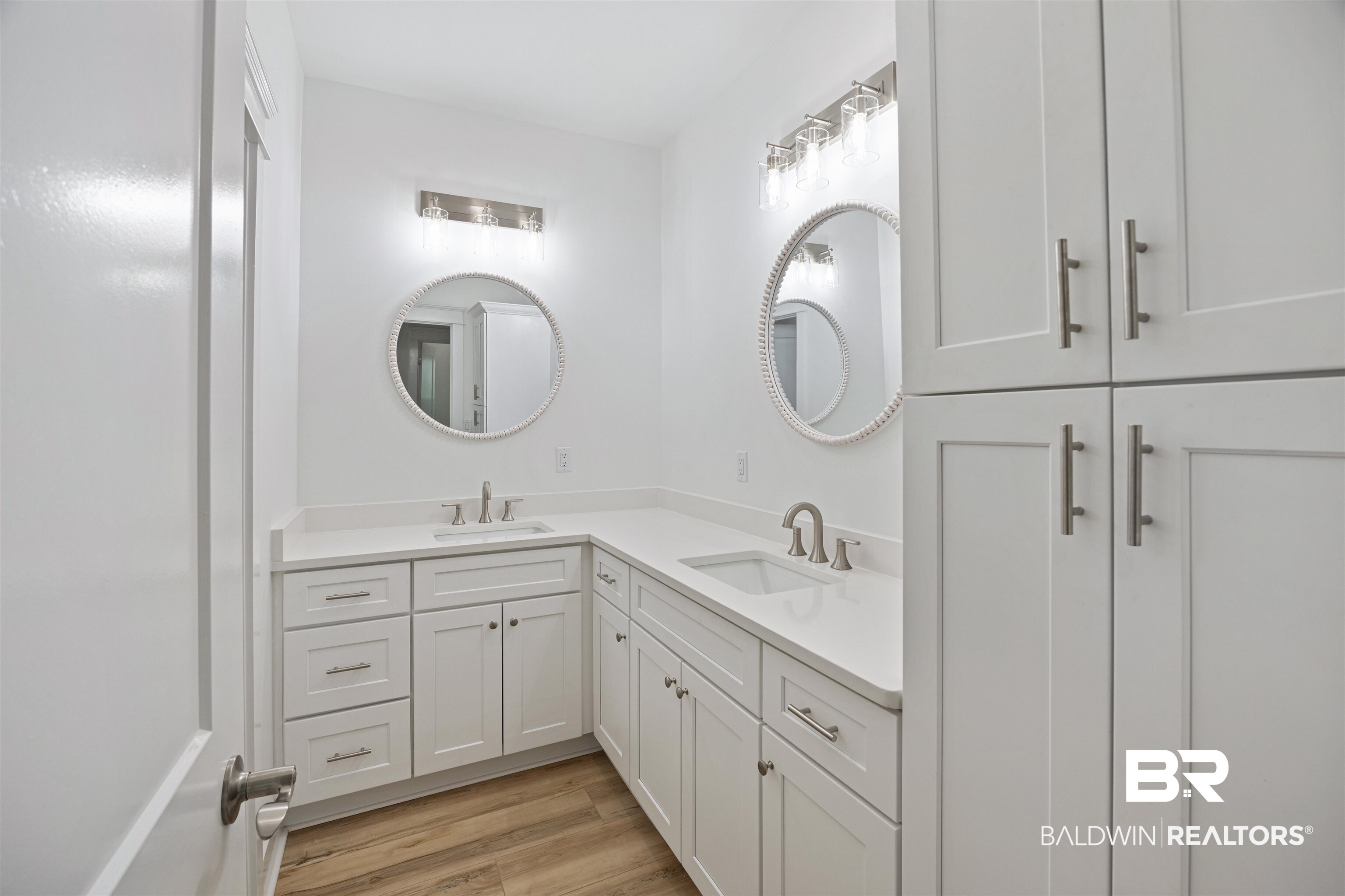 27591 Canal Road Orange Beach, AL 36561 - Photo 42 of 51 Full bathroom with vanity and light wood-type flooring