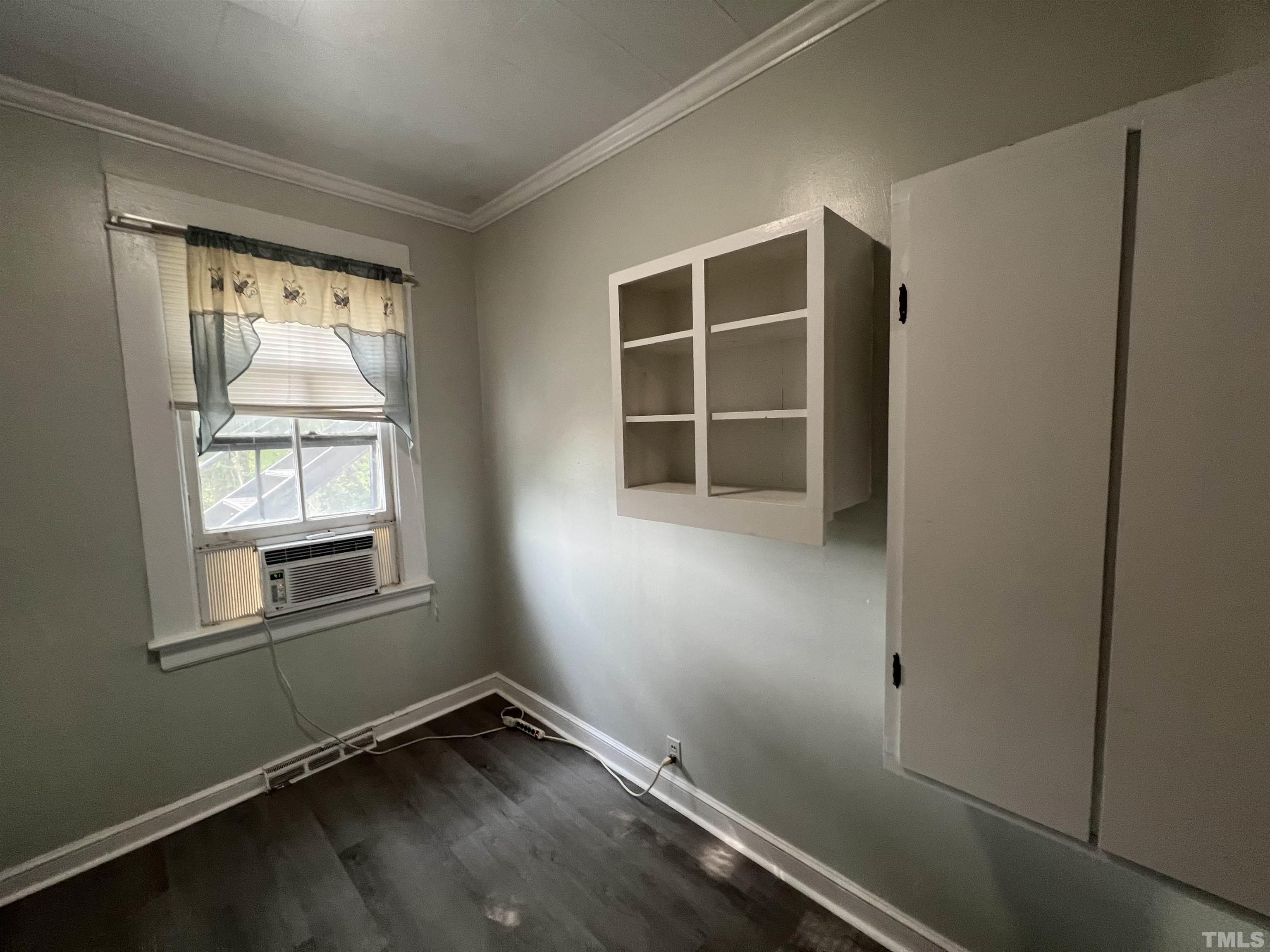 2501 Pickett Road, Unit 5 Durham, NC 27705 - Photo 11 of 17 a view of an empty room with a window