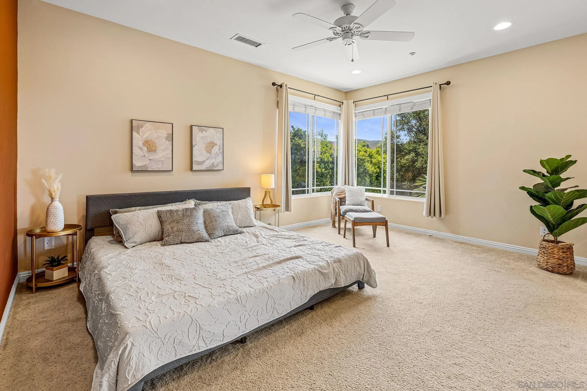 25919 Matlin Road Ramona, CA 92065 - Photo 12 of 42 a spacious bedroom with a bed and a large window