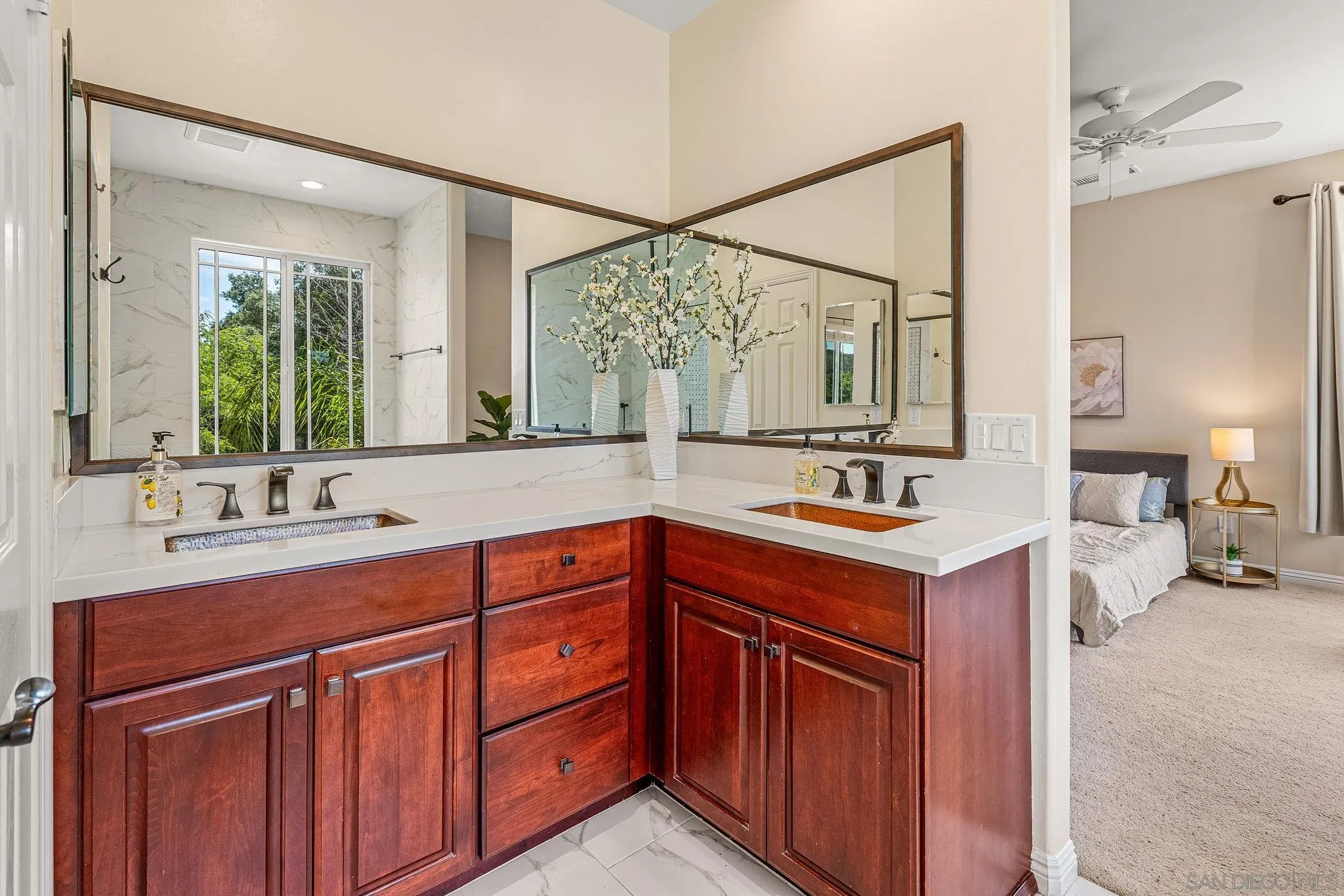 25919 Matlin Road Ramona, CA 92065 - Photo 13 of 42 a bathroom with a sink double vanity and a mirror