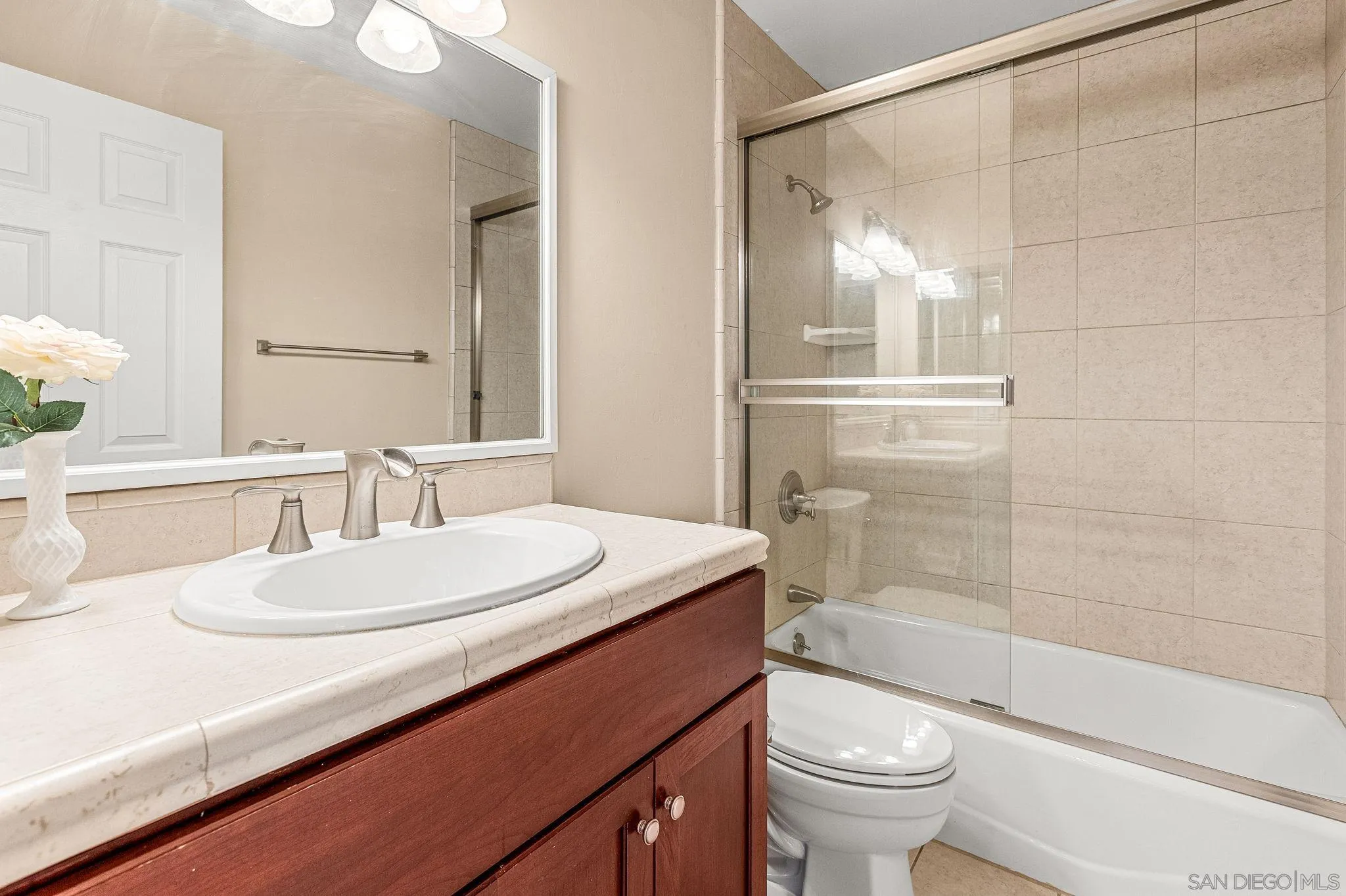 25919 Matlin Road Ramona, CA 92065 - Photo 17 of 42 a bathroom with a sink a toilet and shower