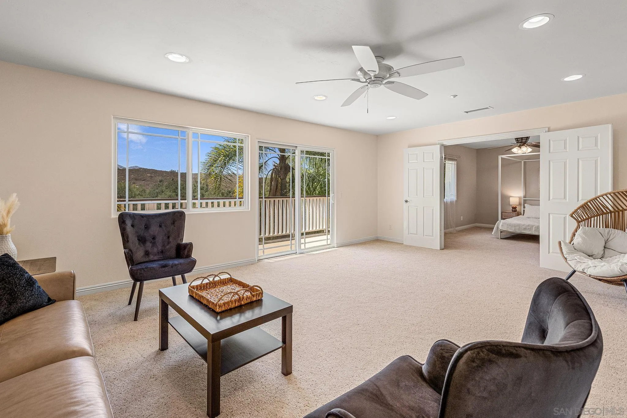 25919 Matlin Road Ramona, CA 92065 - Photo 18 of 42 a living room with furniture and a window
