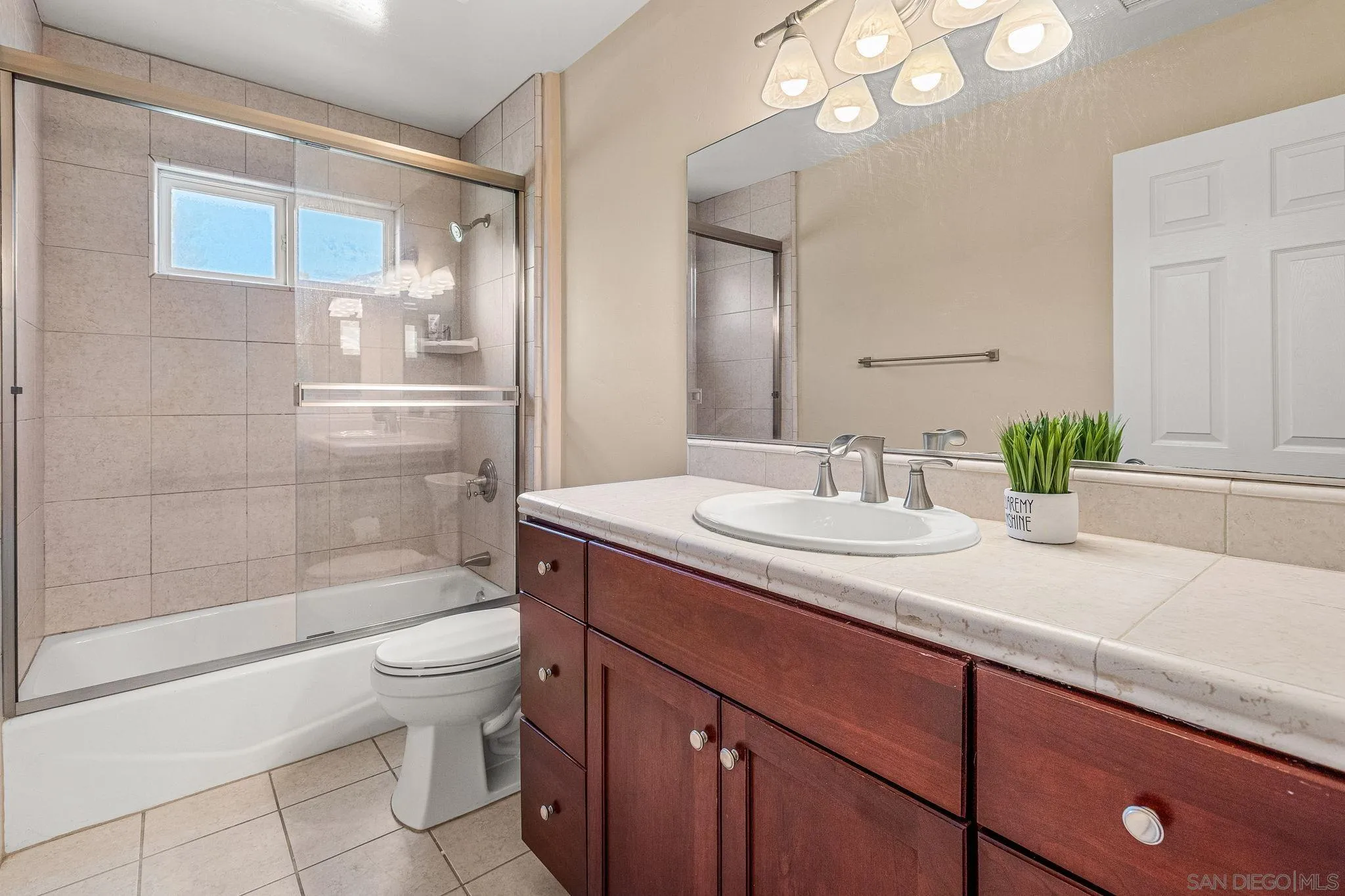 25919 Matlin Road Ramona, CA 92065 - Photo 20 of 42 a bathroom with a sink a toilet and shower