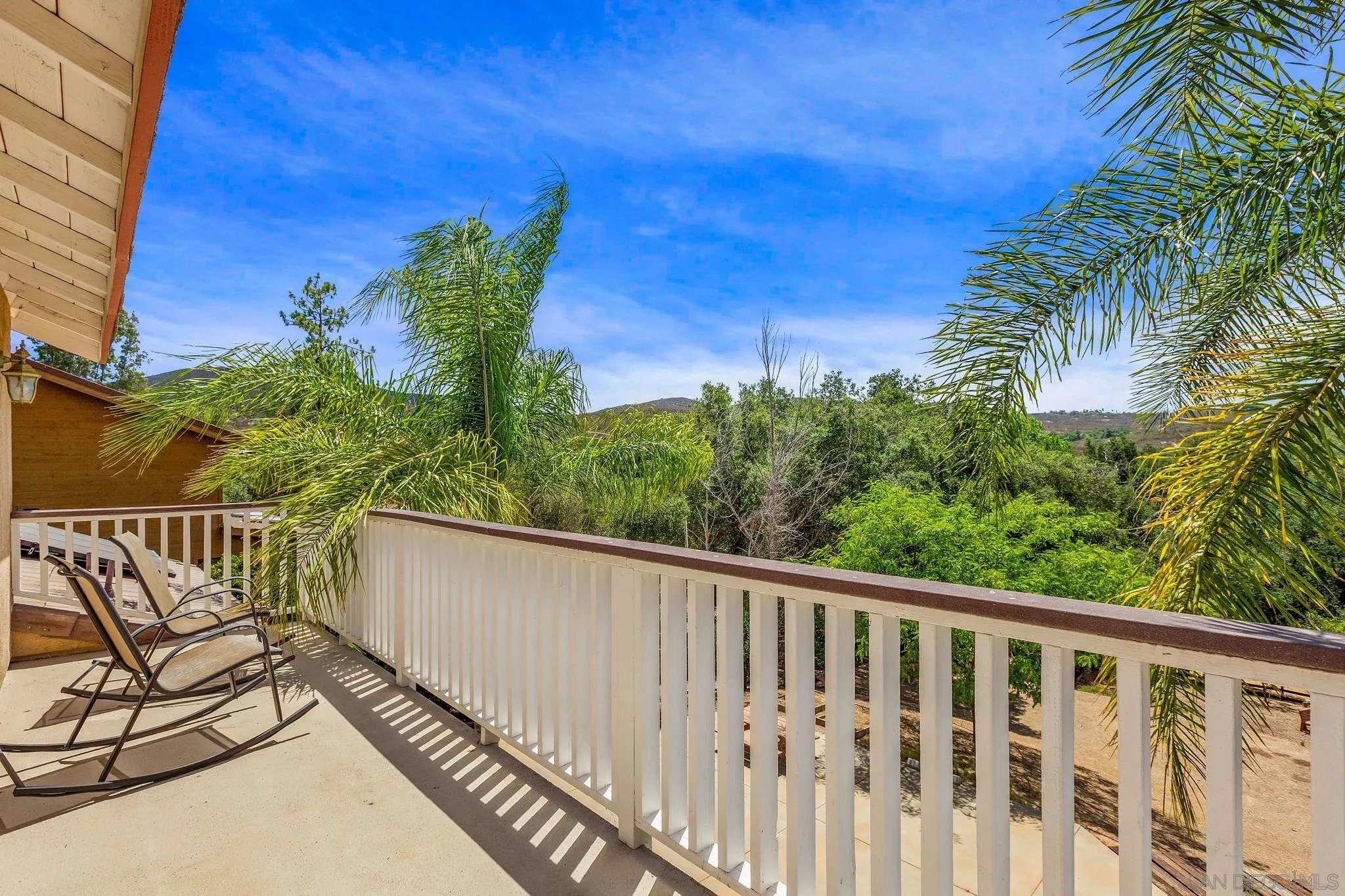 25919 Matlin Road Ramona, CA 92065 - Photo 22 of 42 a balcony with an outdoor space