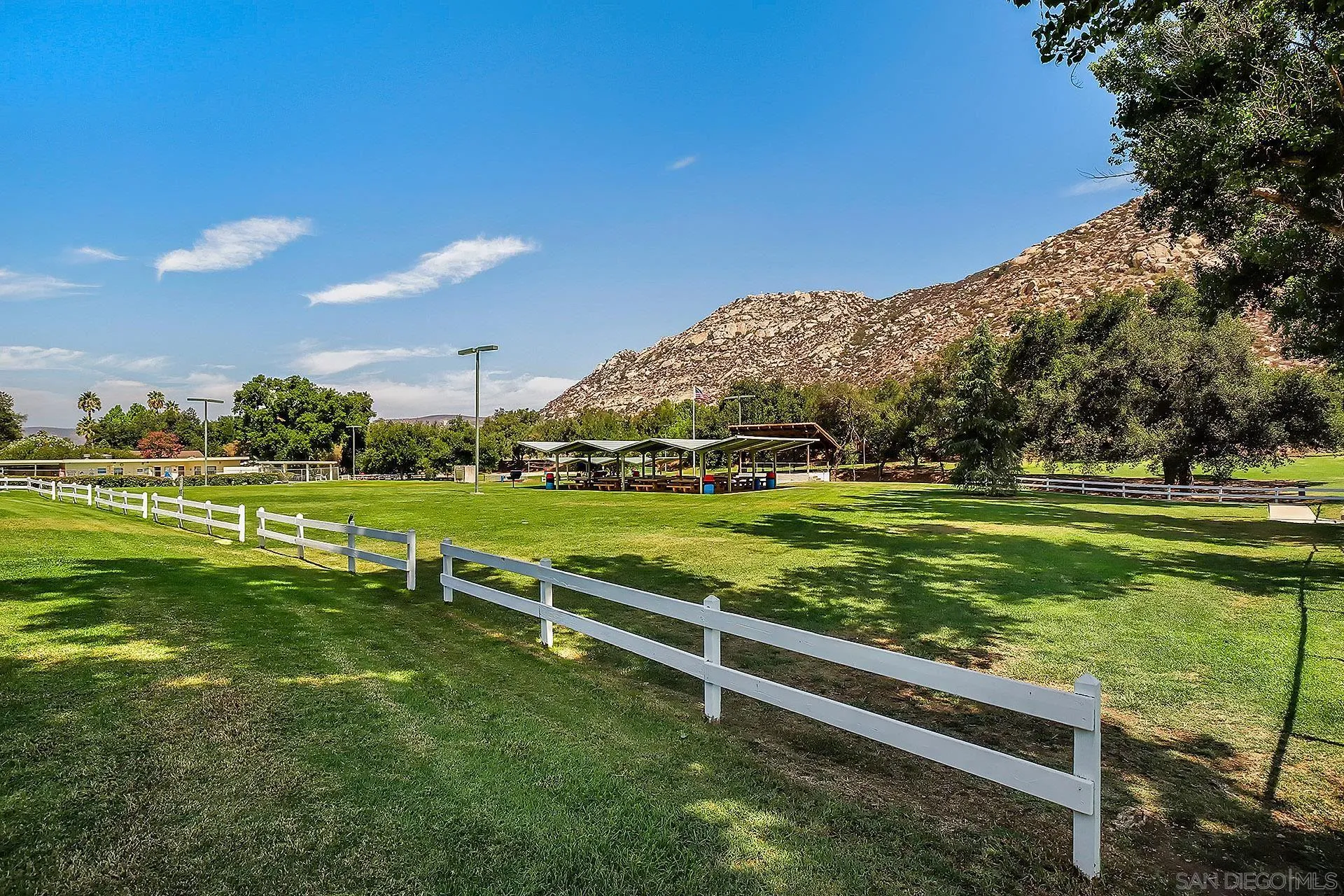 25919 Matlin Road Ramona, CA 92065 - Photo 37 of 42 a view of a golf course with a lake
