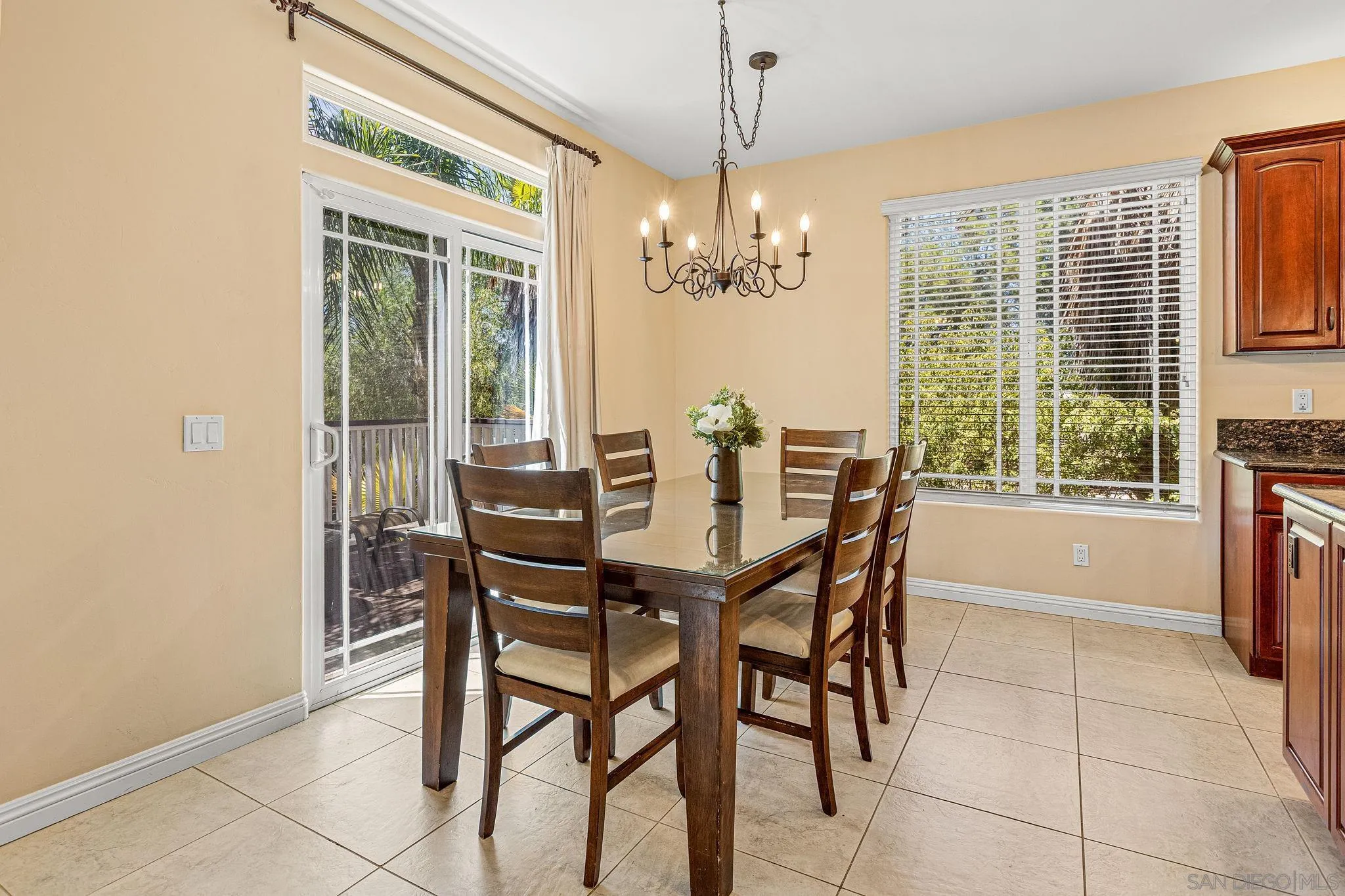 25919 Matlin Road Ramona, CA 92065 - Photo 5 of 42 a view of a dining room with furniture window and outside view