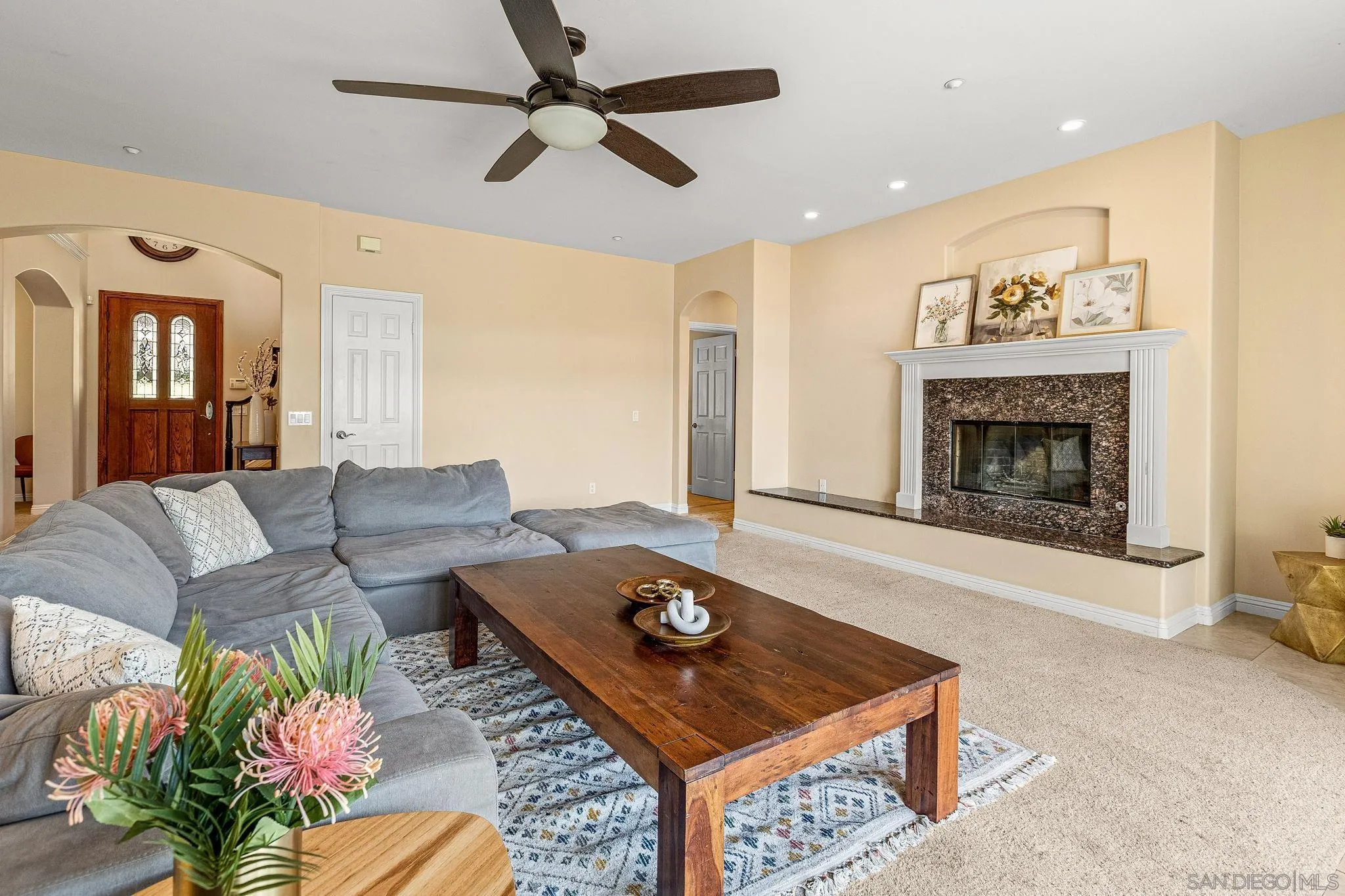 25919 Matlin Road Ramona, CA 92065 - Photo 7 of 42 a living room with furniture and a fireplace
