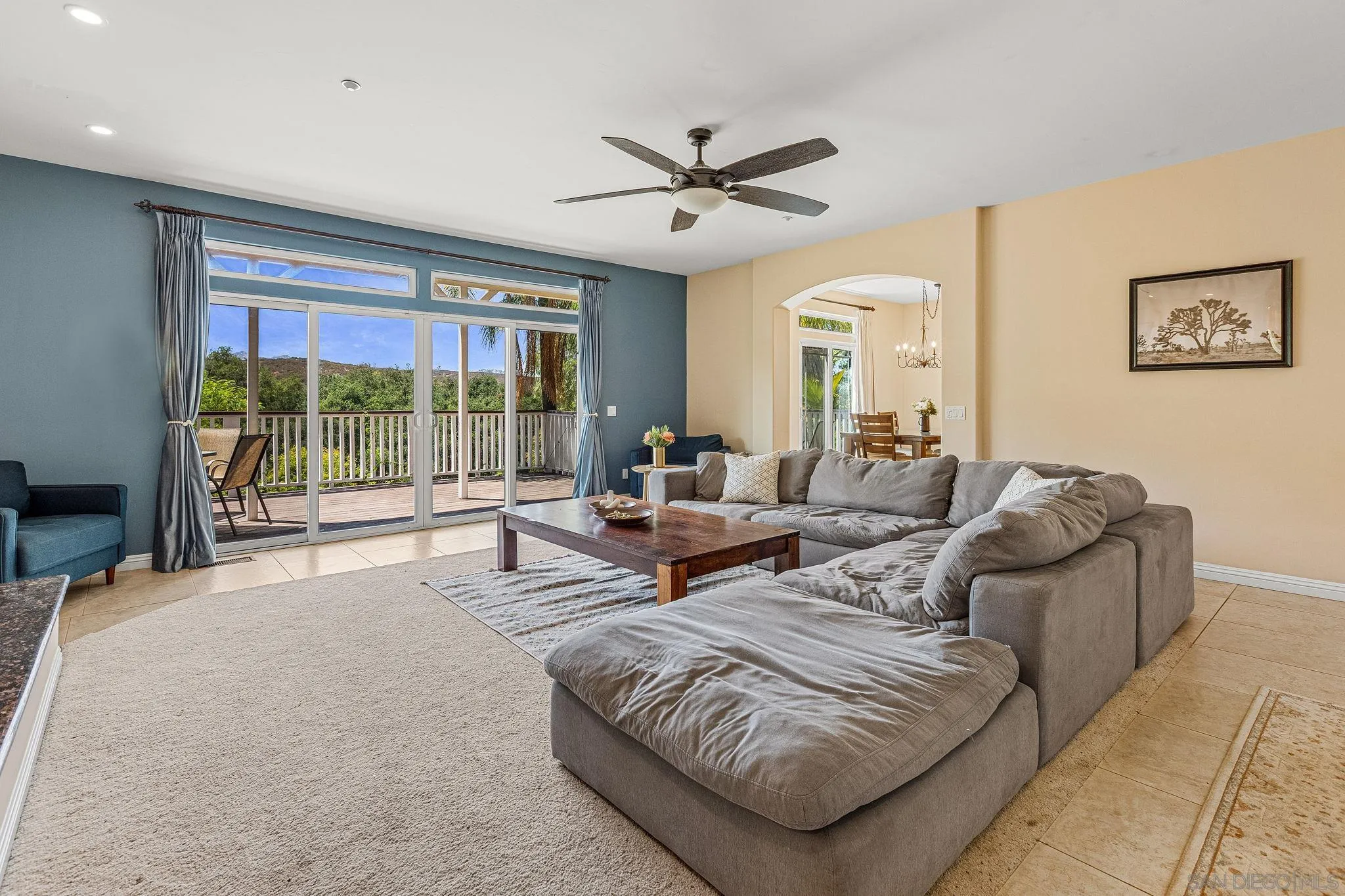 25919 Matlin Road Ramona, CA 92065 - Photo 8 of 42 a living room with furniture and a large window