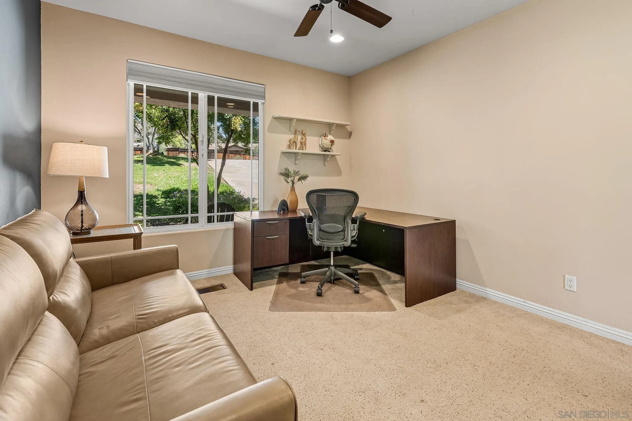 25919 Matlin Road Ramona, CA 92065 - Photo 9 of 42 a work room with furniture and a window