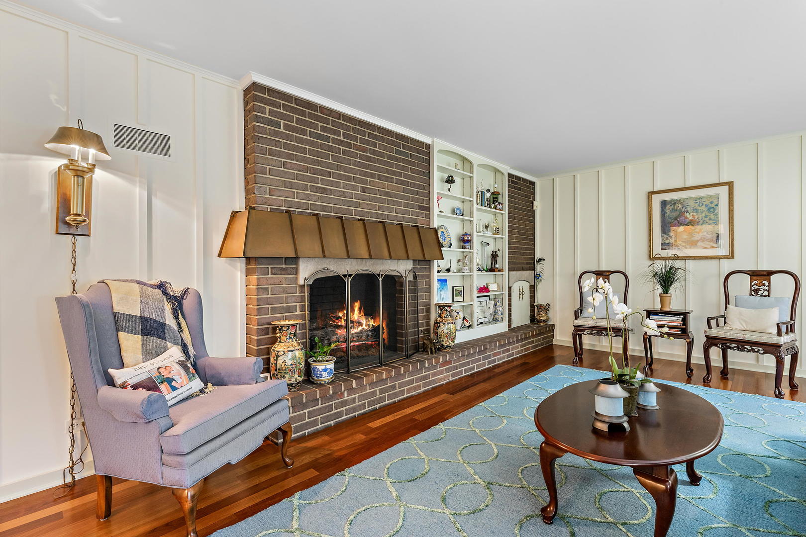 9 Hampton Drive Oak Brook, IL 60523 - Photo 11 of 27 a living room with furniture and a fireplace