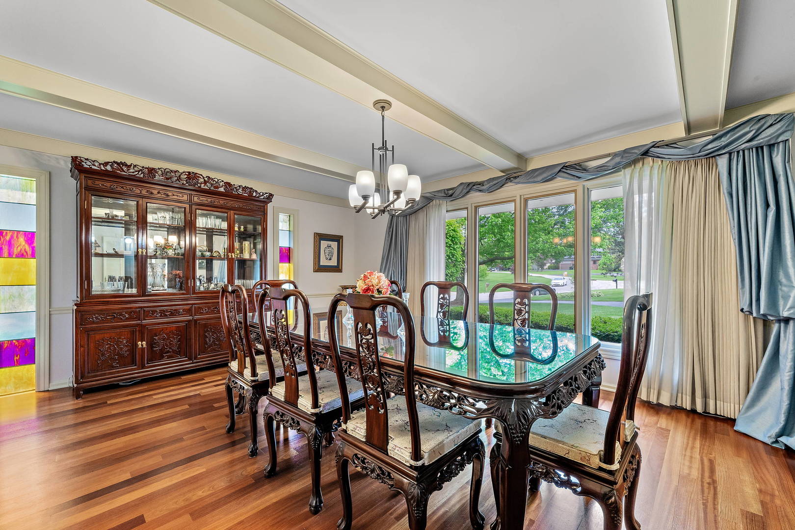 9 Hampton Drive Oak Brook, IL 60523 - Photo 12 of 27 a view of a dining room with furniture window and wooden floor