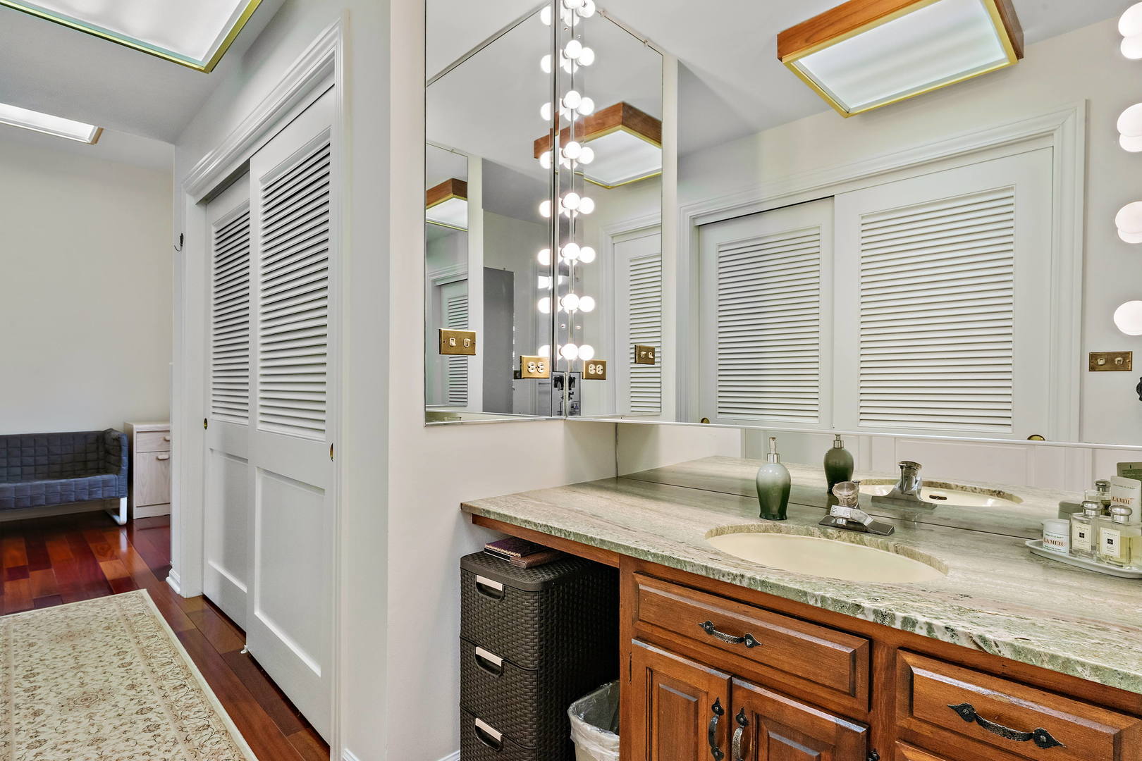 9 Hampton Drive Oak Brook, IL 60523 - Photo 14 of 27 a bathroom with a granite countertop sink and a mirror