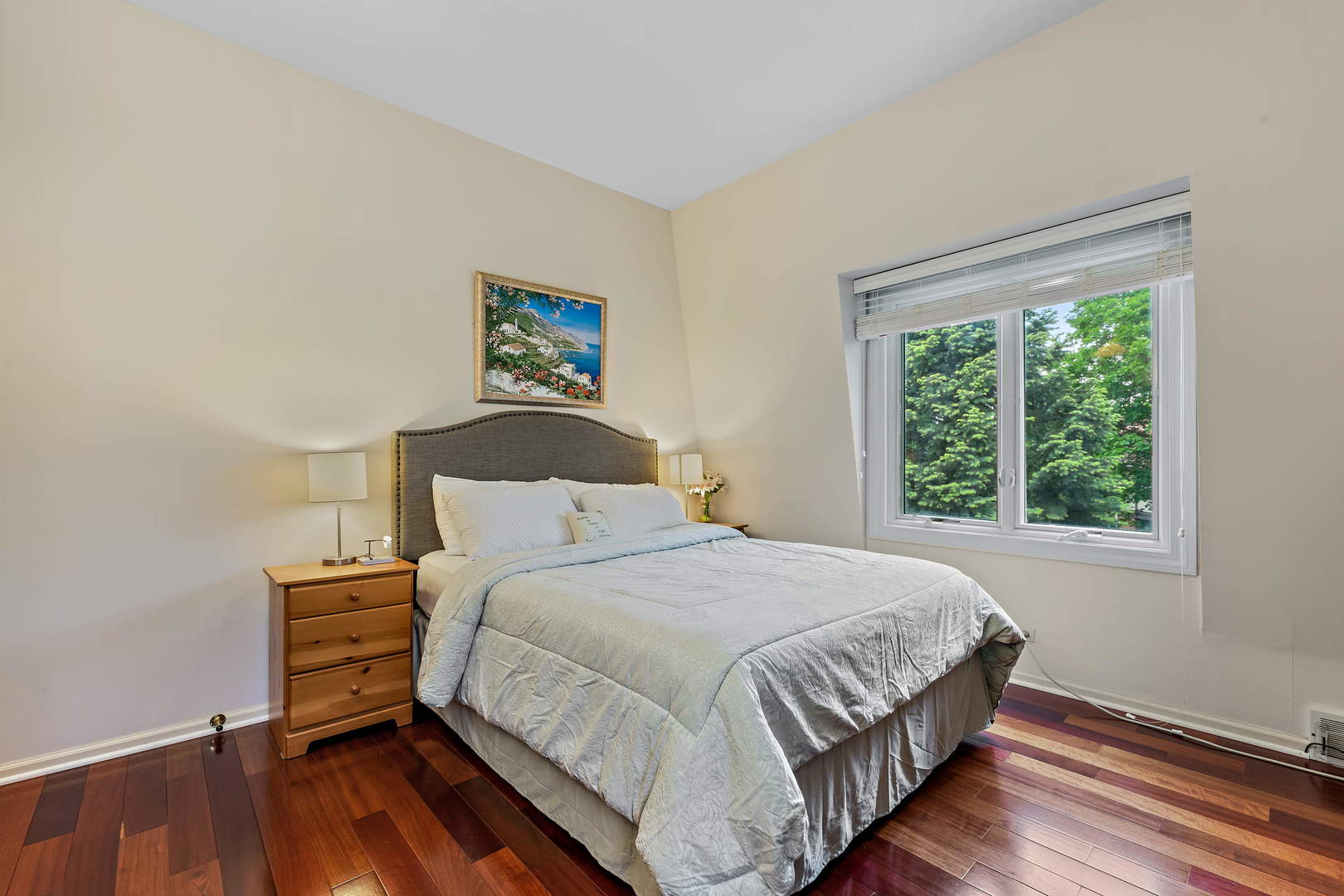 9 Hampton Drive Oak Brook, IL 60523 - Photo 15 of 27 a bedroom with a bed and a window