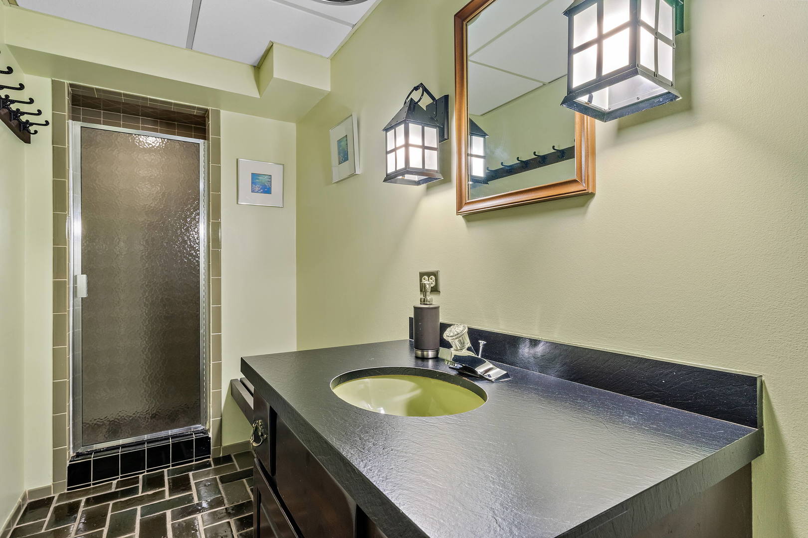 9 Hampton Drive Oak Brook, IL 60523 - Photo 21 of 27 a bathroom with a sink and a mirror