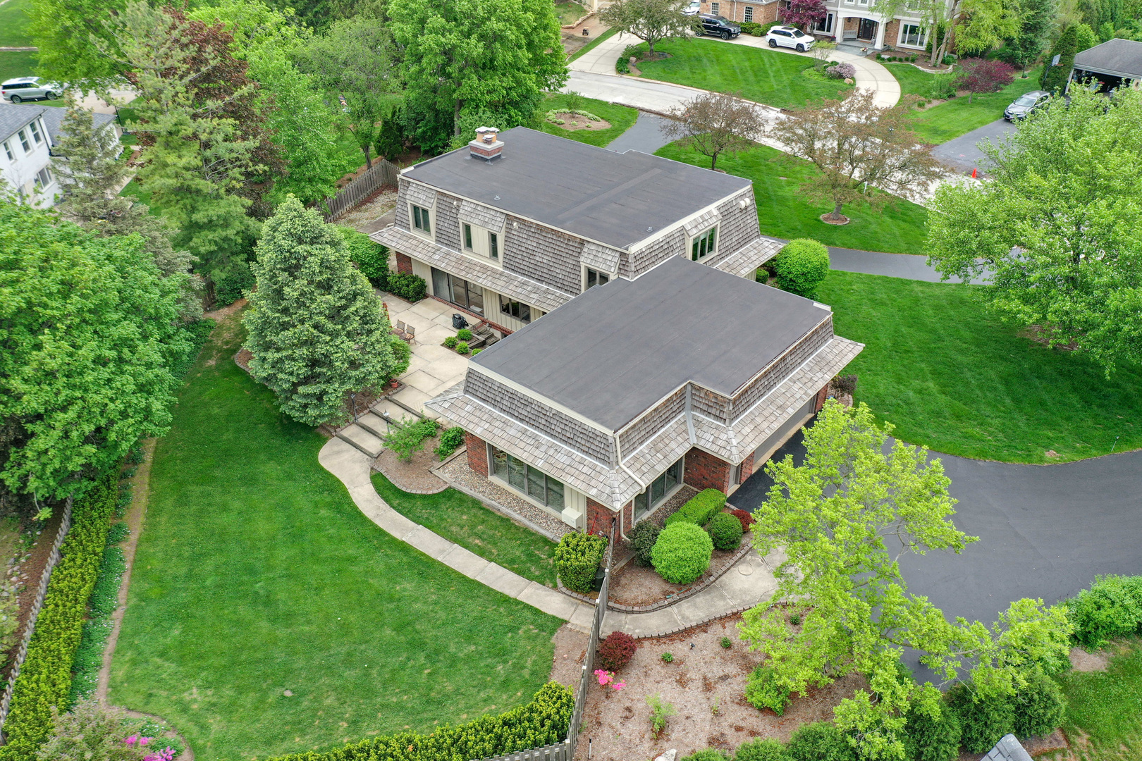 9 Hampton Drive Oak Brook, IL 60523 - Photo 3 of 27 an aerial view of a house with a garden